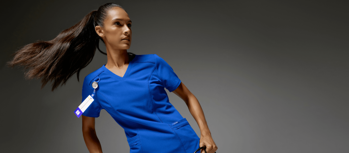 https://www.jaanuu.com/blog/wp-content/uploads/2022/07/Nurse-wearing-blue-scrubs-1140x500.png
