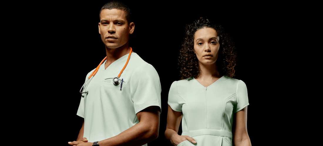 Man-and-woman-wearing-green-jaanuu-scrubs-1.png