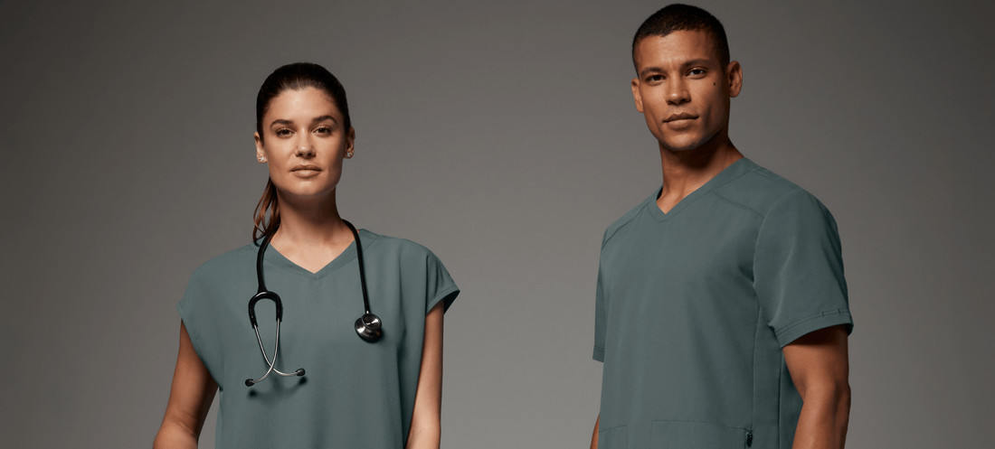 Man-and-woman-with-stethoscopes-wearing-scrubs.png