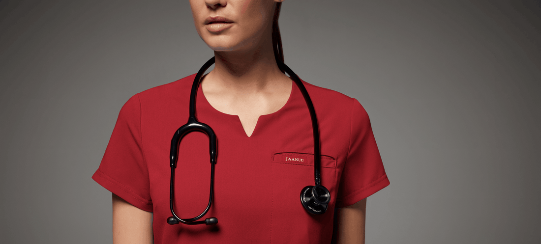 Nurse-wearing-jaanuu-wine-scrubs-and-stethoscope.png