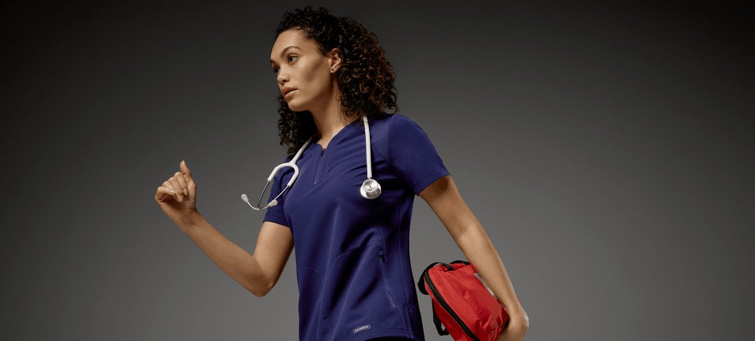 Woman-wearing-v-neck-top-scrub-in-navy.png