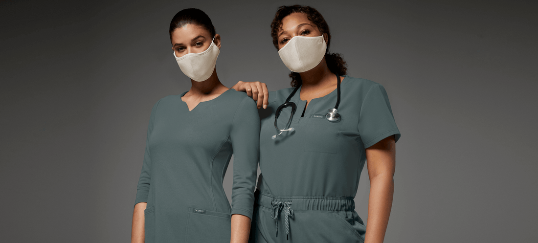 Women-with-scrubs-and-face-masks.png