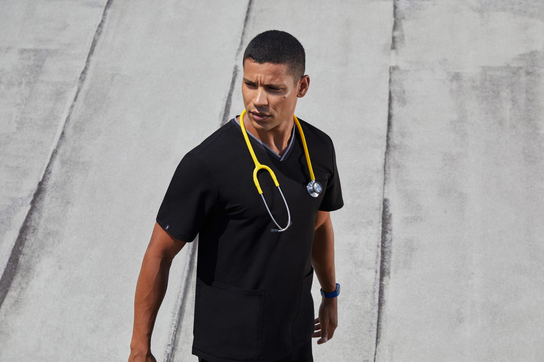 doctor-wearing-jaanuu-black-scrubs-scaled.jpg