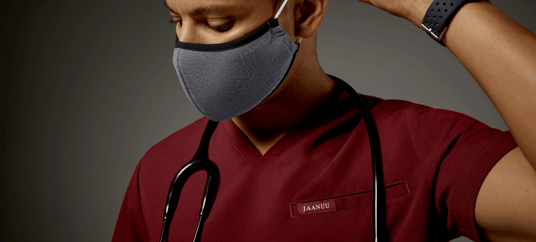 male-nurse-wearing-gray-mask-and-red-scrub.png