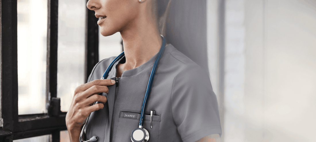 medical-student-wearing-gray-scrubs-and-stethoscope.png