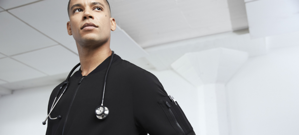 nurse-with-black-bomber-jacket-1024x462.png