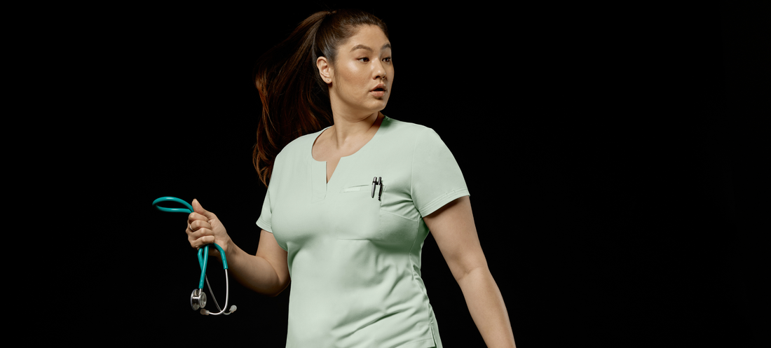 plus-nurse-running-black-background-jaanuu-scrubs.png