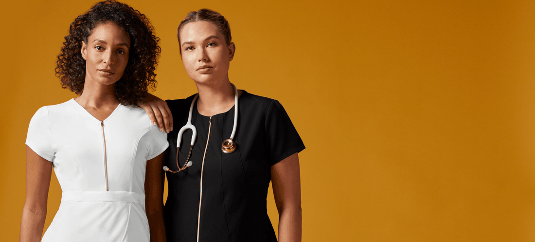 two-women-with-black-and-white-jaanuu-scrubs.png