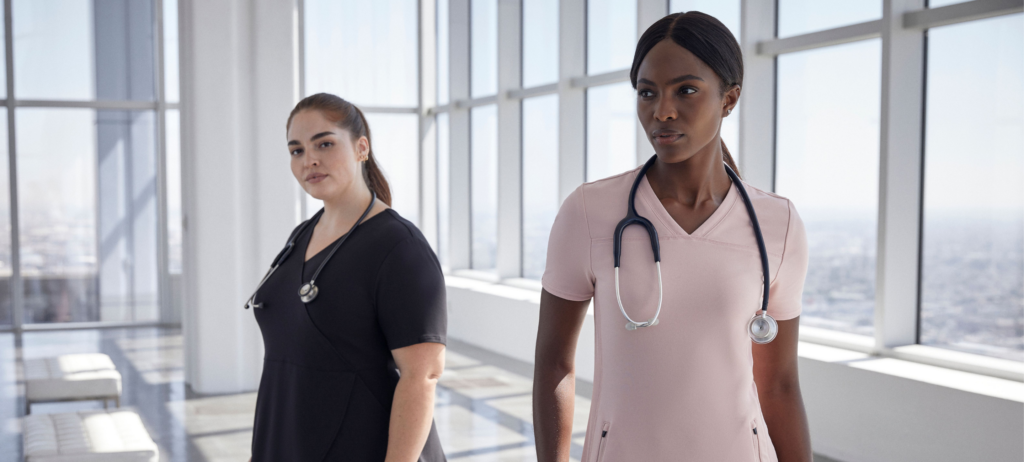 woman-with-scrubs-working-at-hospital-1024x462.png